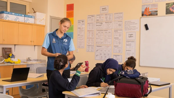WellSpring Private School Secondary coach working with students