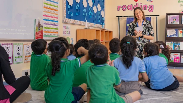 young students learning from teacher at wellspring private school early childhood
